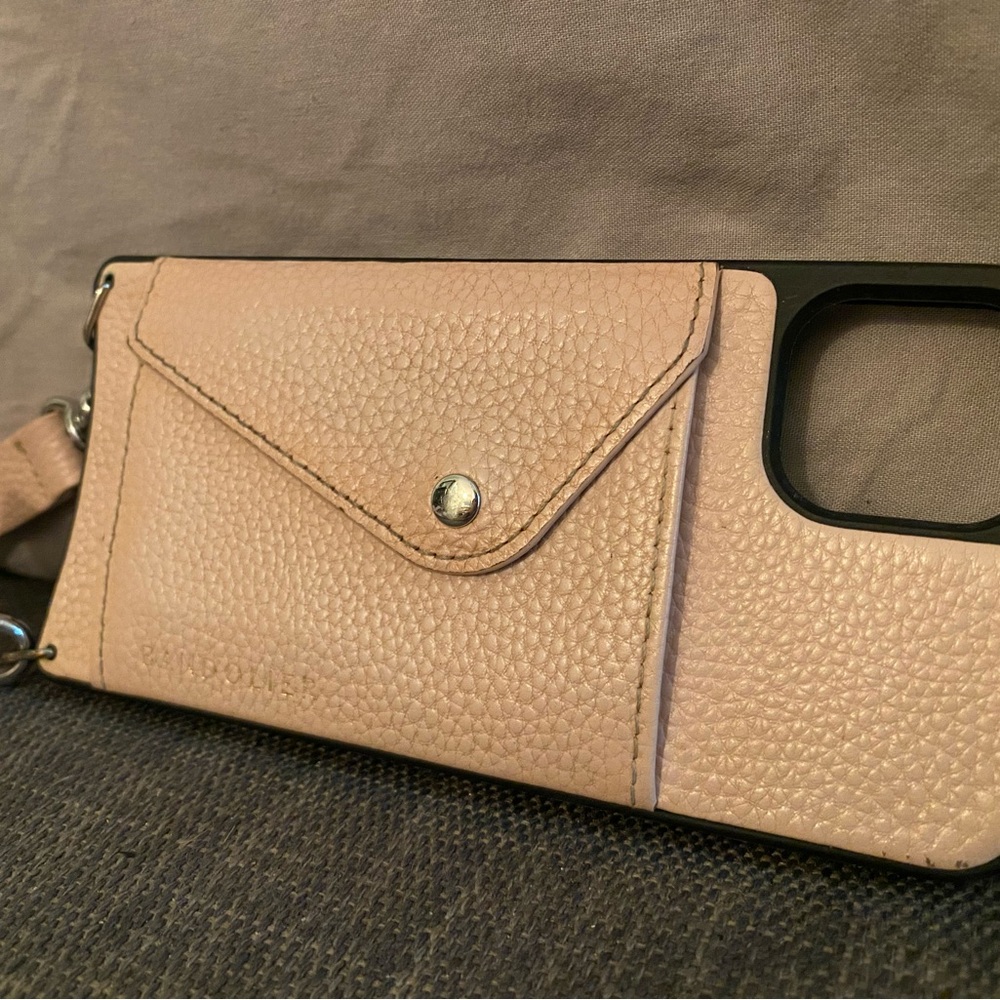 Bandolier phone case with strap pink